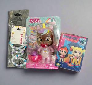 lot 56 image: New Birds Of Prey Funko Collectable - Cry Babies Doll - Claires Necklace.