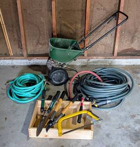 lot 123A image: Hoses, Spreader and Gardening Tools