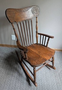 lot 52 image: Vintage Floral Pressed Back Spindle Back Rocking Chair
