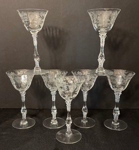 lot 66 image: Vintage Cambridge Rose Point Etched Champagne Stemware
