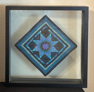lot 104 image: Beautiful Hand Crafted Textile Quilt Square Set in a Floating Frame