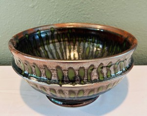 lot 88 image: Handcrafted Ceramic Bowl with Green and Brown Glaze