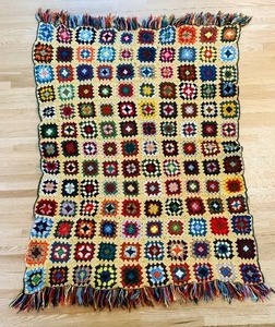 lot 55 image: Colorful Handcrafted Granny Square Crochet Blanket