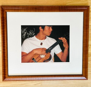 lot 59 image: Signed Framed Poster  Photograph Jake Shimabukuro 2009