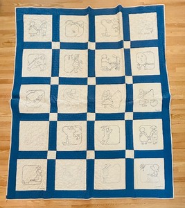lot 44 image: Handcrafted Vintage Blue and White Quilt with Embroidered Scenes