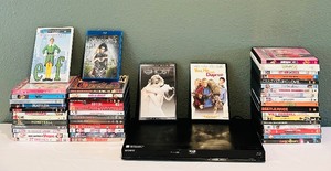 lot 45 image: Sony BDP-S580 3D Blu-Ray Disc DVD Player and Variety of Movies including Elf, Beetlejuice, The Bodyguard and More