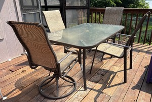 lot 135 image: Glass Top Patio Table with Four Chairs