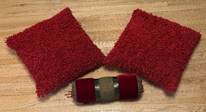 lot 134 image: Three  Ruby Red Accent Pillows