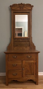 lot 7 image: Antique Wooden Dresser with Mirror and Carved Details