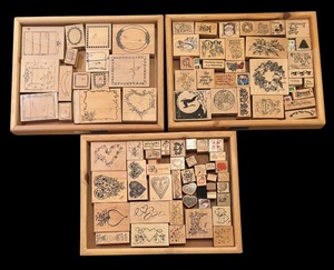 lot 413 image: Three Stamp Trays Full of Crafting Stamps of Hearts, Borders, Christmas and More