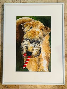lot 392 image: Framed Art by Helen Moreland Featuring Adorable Dog with Candy Cane