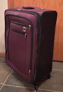 lot 287 image: Purple Suitcase