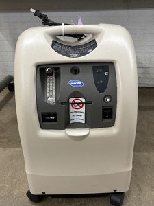 lot 22 image: MSRP $1900 Invacare Profecto2 Oxygen Concentrator WInvacare HomeFill System Port Designed To Reduce Unscheduled Maintenance Great For&nbspOxygen Bars, Spas, Torch Welding, Glass Works, Fish Farming & More - Good Working Condition