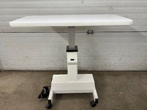 lot 45 image: Power Height Adjustable Sit To Standing Desk Instrument Table with Smooth Lift Mechanism. Switch easily between sitting and standing with this ergonomic workstation. Spacious surface, modern design & customizable height for comfort & productivity.