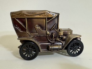 lot 57 image: Vintage 1970s Brass Plated 1910 Stanley Steamer Bank