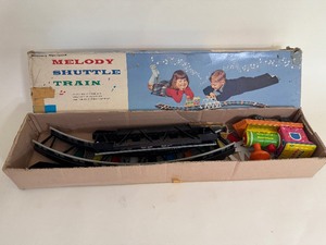 lot 85 image: Vintage 1966 Frankonia Matsuzo Kosuge Melody Shuttle Train Battery Operated Music Toy