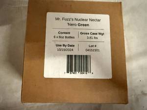 lot 136 image: 8 Bottles of Mr. Fuzz Nuclear Nectar Hot Sauce