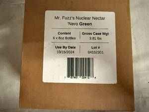 lot 137 image: 8 Bottles of Mr. Fuzz Nuclear Nectar Hot Sauce