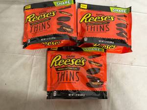 lot 145 image: 3 Bags of Dark Reeses Thins