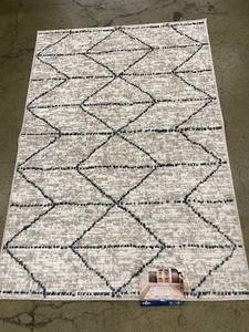 lot 11 image: Mohawk Home 30 x 45 Beige and Navy Area Rug