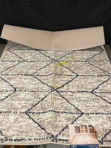 lot 25 image: Mohawk Home 30 x 45 Area Rug with Geometric Pattern