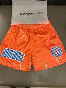 lot 81 image: Gymwolf Orange Gym Shorts with Lightning Pattern, Size M