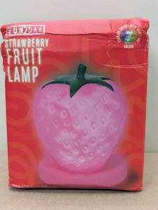 lot 76 image: FUN DAY Strawberry Fruit Squish Table Lamp
