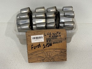 lot 62 image: Ford Truck Lug Nuts and Center Caps