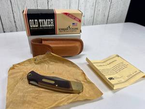 lot B131 image: 1997 Schrade Old Timer Golden Bear Lockback Knife with Leather Sheath and COA, low production number