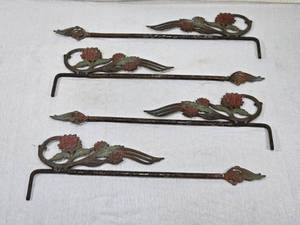 lot 29 image: Four Decorative Swivel Curtain Rods