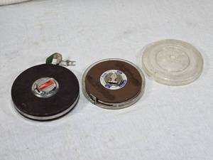 lot 42 image: Lot of Vintage Measuring Tapes - Lufkin 100-foot non-metallic tape, Evans 100-foot