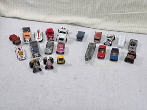 lot 56 image: Lot of Vintage Die-Cast Toy Cars and Trucks including a 1979 Matchbox Ford Model A cereal box toy