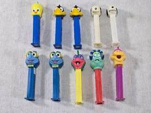 lot 61 image: Lot of PEZ Dispensers with Various Characters - Tweety, Snoopy, Daffy Duck and PEZ Characters