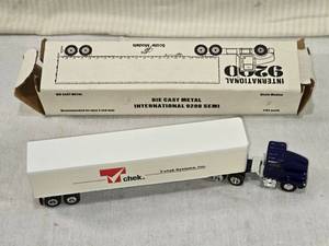 lot 85 image: Die Cast T-chek Systems, Inc Metal International 9200 Semi Scale Model Truck - 164 scale