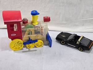 lot 93 image: Vintage Ideal Toy Train and Firebird Car