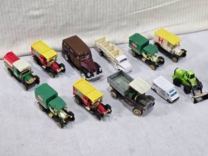lot 107 image: Die-Cast Toy Cars and Trucks - Pure Mineral Water, H Truck, Express Truck, Woody