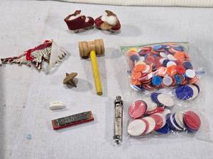 lot 108 image: Toys and Game Pieces with Harmonica and Whistle, Game Chips