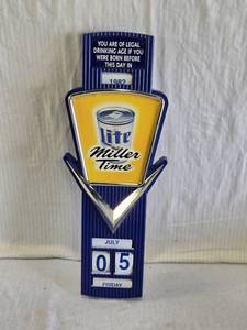 lot 125 image: Miller Lite Vintage Advertising Legal Age Wall Calendar