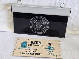 lot 127 image: Duff Beer Wall Hanging & Funny Beer Sign that says Beer has its faults... but at least it gives you a run for your money