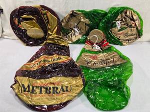 lot 147 image: Lot of Inflatable Advertising Cans andor Bottles - METBRAU and Golden Champale.