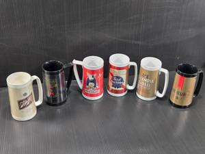 lot 160 image: Beer Stein Mugs with Brand Logos from Schlitz, Michelob, Bud Light, Pabst Blue Ribbon, and Olympia Gold