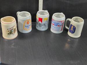 lot 172 image: Beer Steins and Mugs from well-known beer brands such as Olympic, Natural Light, Michelob, and Budweiser