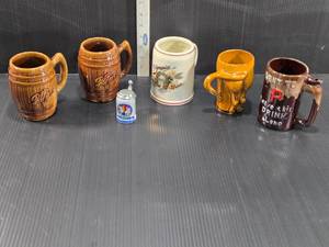 lot 174 image: Variety Beer Mugs and Steins - Blatz, Funny Horses Ass Mug, Martinsbrau and Others (1 with cracked stem piece)