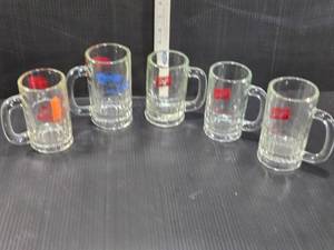 lot 183 image: Beer Mugs with Logos - Schlitz, Cheers to you from KBJR-TV6, imagery of Alexandria, Minn and Others