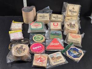 lot 197 image: HUGE Lot Beer Branded Coasters and Napkin Coasters from brands such as such as Waldech, Spaten, Labatts, Carlsberg, Lwenbrau, and Binding Bier and More