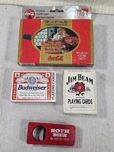 lot 206 image: Coca-Cola Playing Cards, Roth Bier bottle opener, Budweiser and Jim Beam Cards