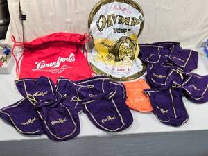 lot 213 image: Crown Royal Bags, Leinenkugel Backpack and Olympia Beer Blowup Can Advertisement