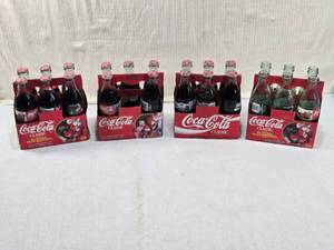 lot 216 image: Coca-Cola Classic Bottles in Original Packaging Some Empty, Some Full