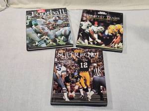 lot 221 image: Sports Illustrated Books Featuring Football by Peter King, Greatest Teams by Tim Crothers, and The Super Bowl by Austin Murphy