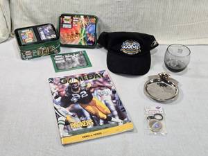 lot 247 image: Sports Memorabilia Including Monday Night Football interactive TV card game, a Green Bay Packers GAMEDAY magazine, and a Super Bowl XXXVII hat and More
